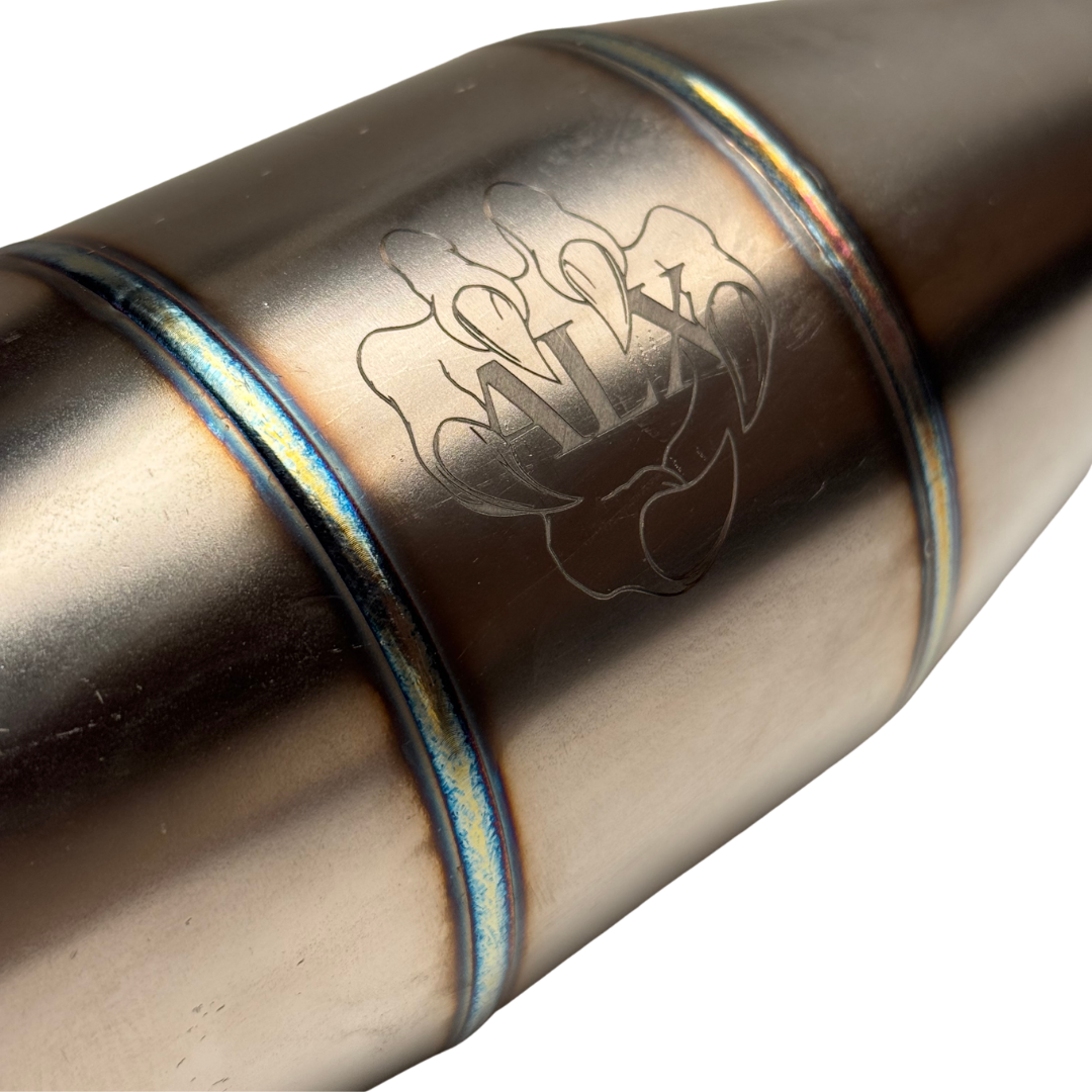 Engraved ALX branding on the titanium finish of the Big Bore V2 pipe