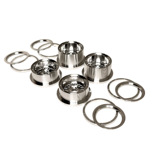 Beast RC Baja 5B complete billet wheel set with 8-piece beadlocks, angled view from an alternate angle showing the narrower front wheels with hidden-bolt beadlock rings