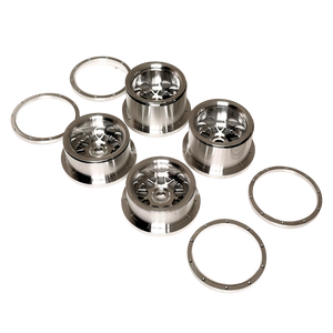 Beast RC Baja 5B complete billet wheel set with 8-piece beadlocks, top-down view showing the narrower front wheels with hidden-bolt beadlock rings
