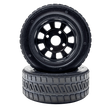 Two black tires with tread patterns on a white background