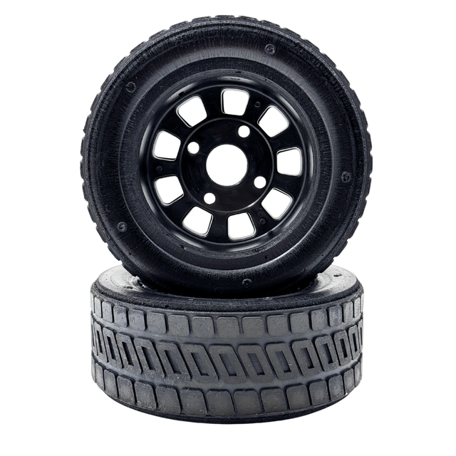 Two black tires with tread patterns on a white background