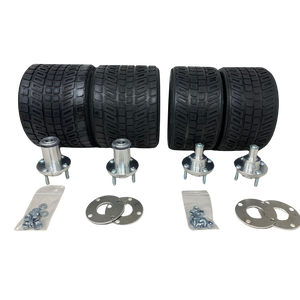 Set of tires and metal components on a white background