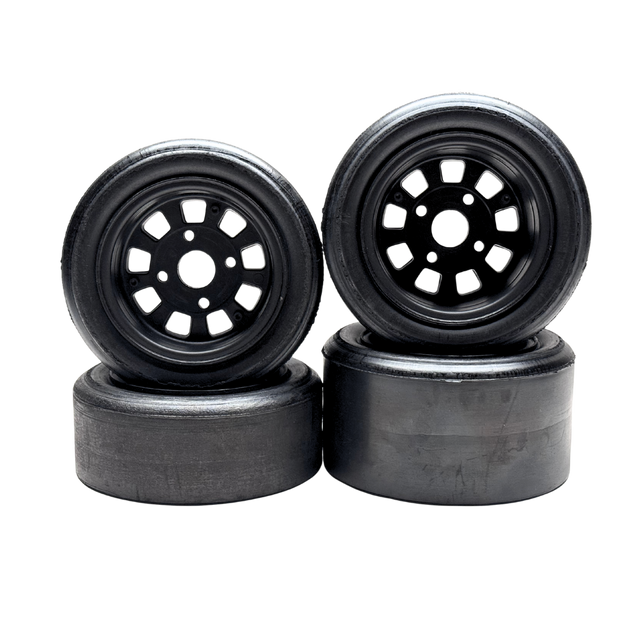 Four black wheels with plastic rim on a white background