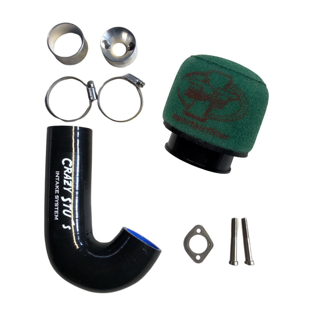 Car air intake system components including a black silicone hose, green air filter, and metal parts on a white background.