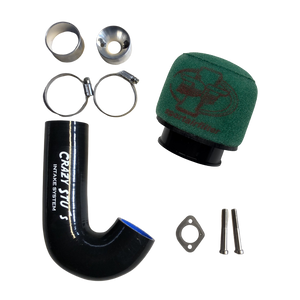 Car air intake system components including a black silicone hose, green air filter, and metal parts on a white background.