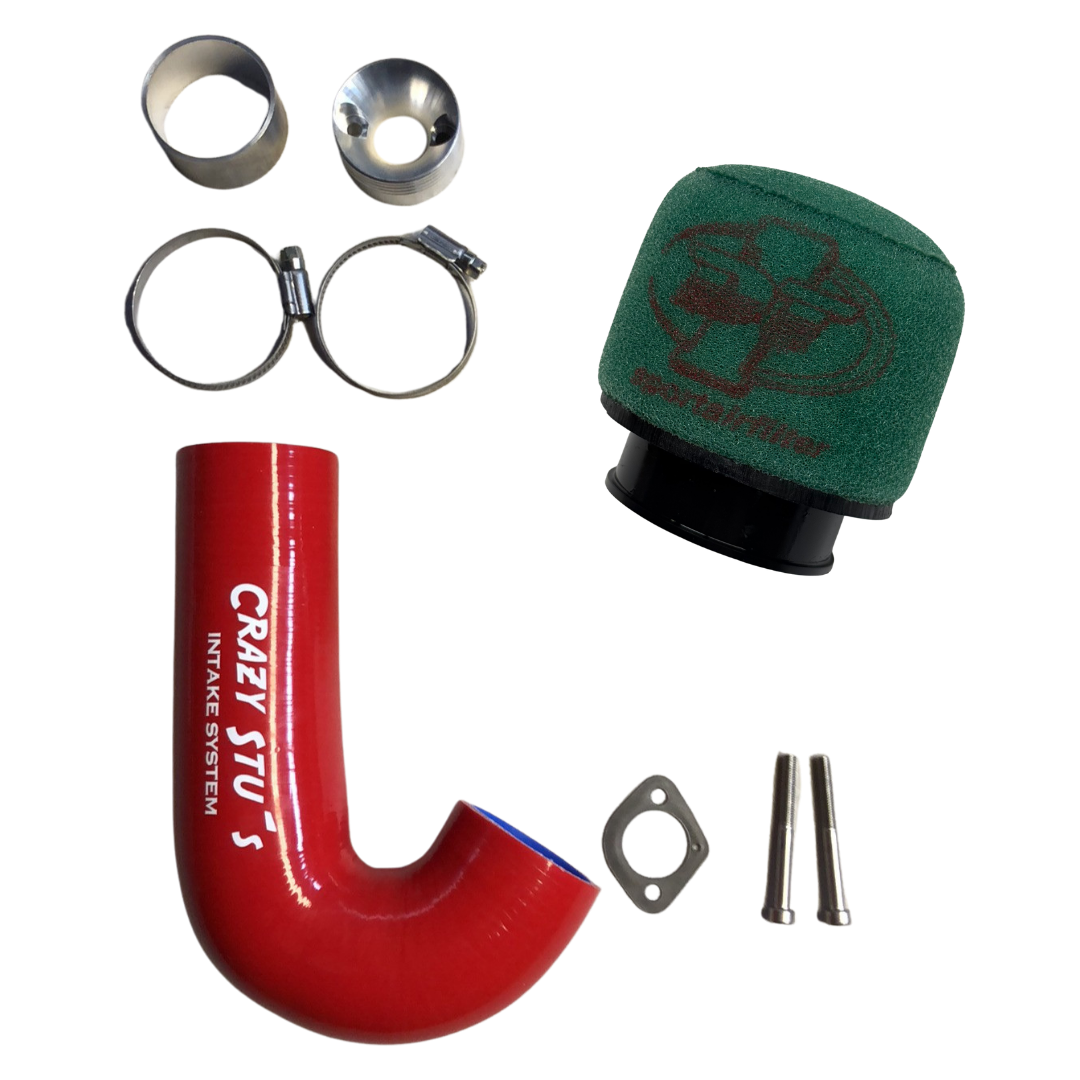 Collection of automotive parts including a red intake pipe, green air filter, and metal components on a white background.