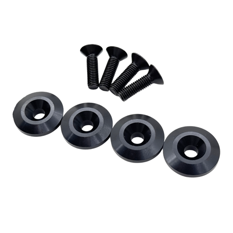 Set of black screws and washers on a white background