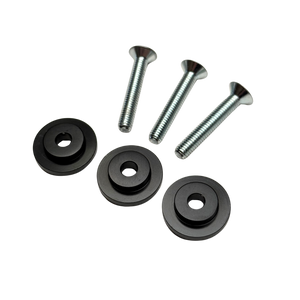 Set of black rubber washers and metal screws on a white background