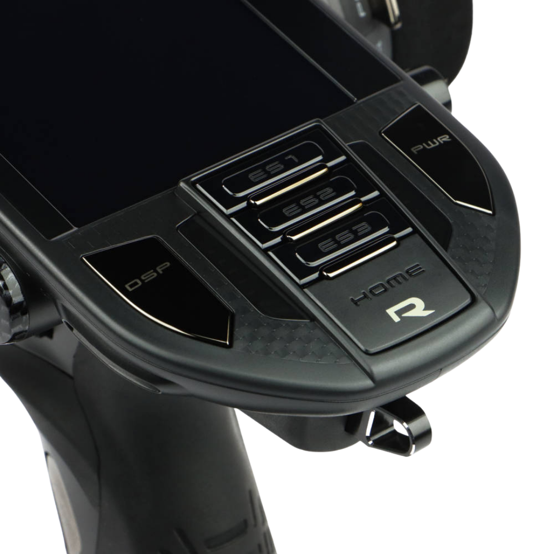Close-up of a black electronic device with control buttons on a white background