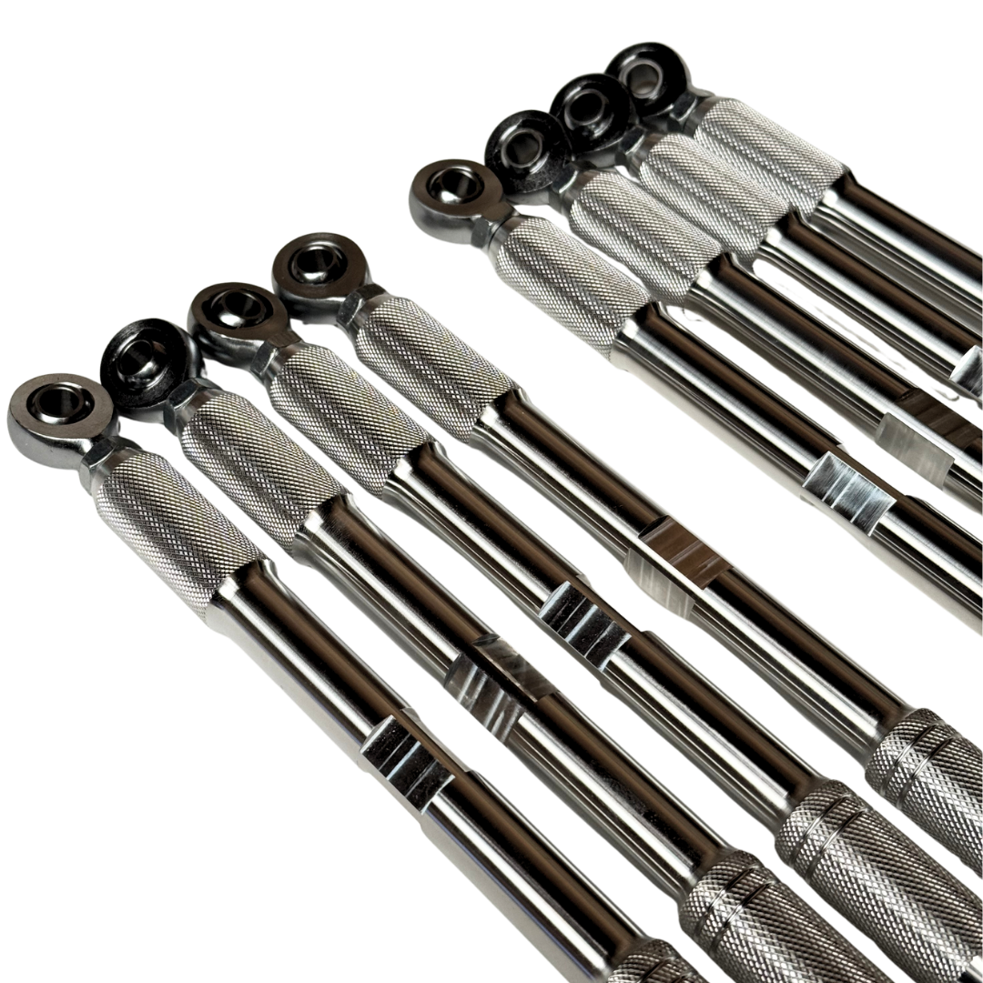 A set of metallic mechanical extension bars with knurled grip sections and ball-end fittings, arranged diagonally on a plain white background.