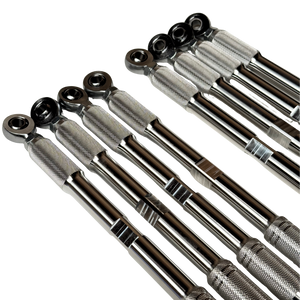 A set of metallic mechanical extension bars with knurled grip sections and ball-end fittings, arranged diagonally on a plain white background.