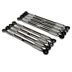 Eight automotive tie rod ends with knurled silver metal centers and black spherical caps, arranged in two parallel rows on a plain white background.