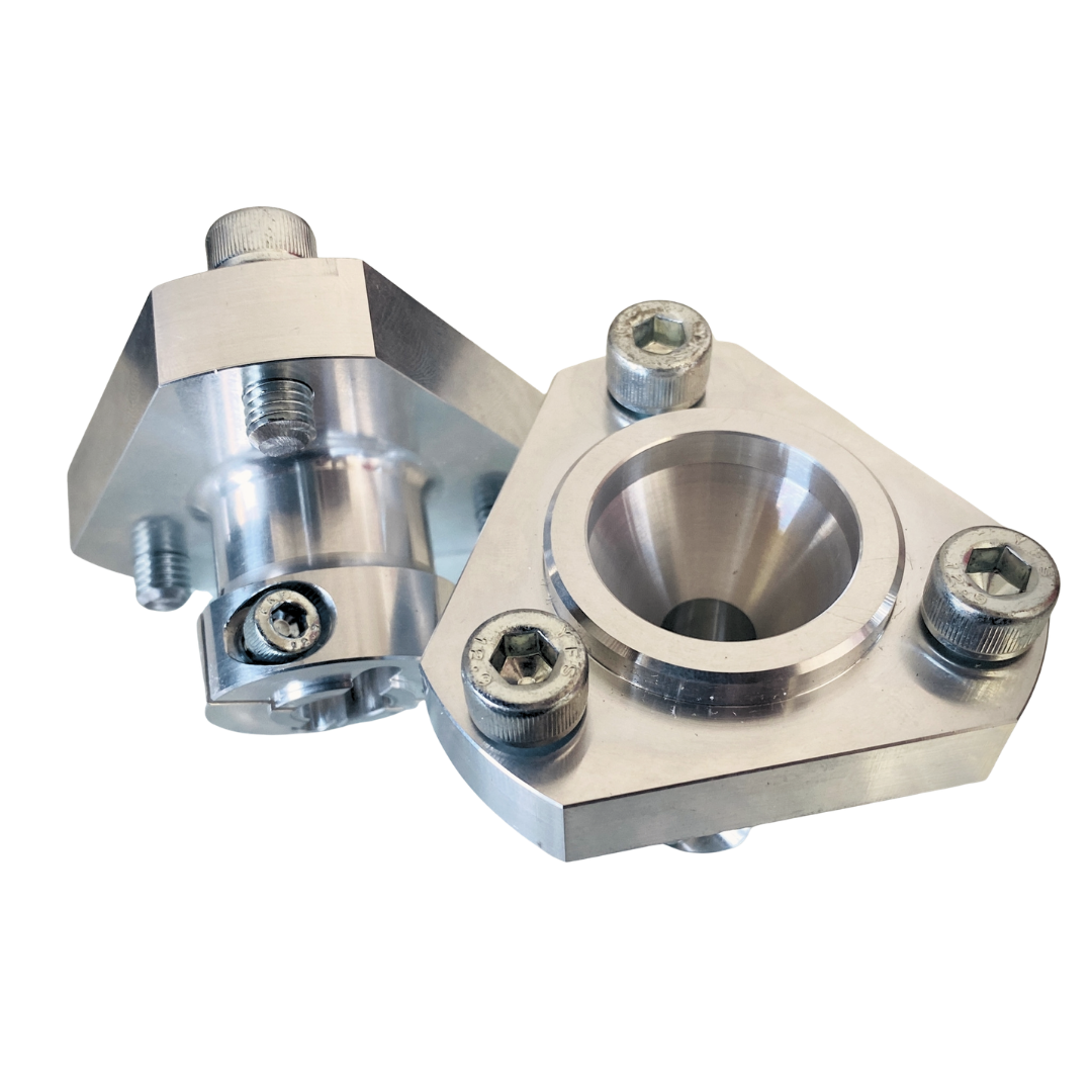 Metal mechanical component with threaded holes on a white background