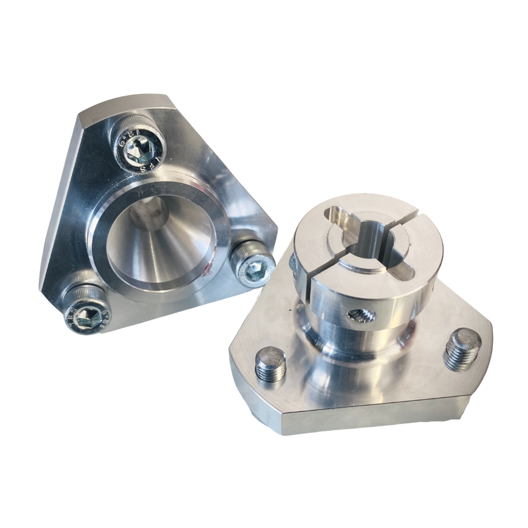 Two metal mechanical components on a white background