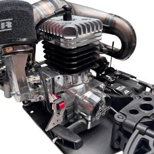 Close-up of a detailed engine block with visible branding on a white background