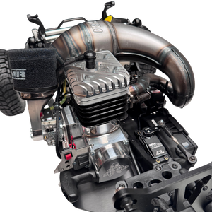Close-up of a high-performance engine with visible branding on a white background