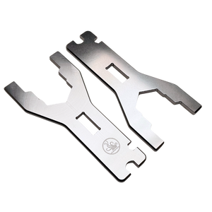 Two metallic tools on a white background