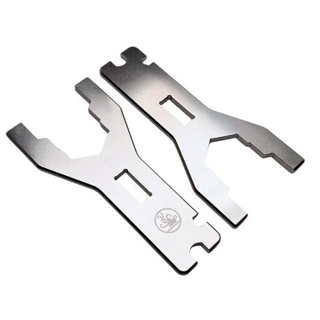 Two metallic tools on a white background