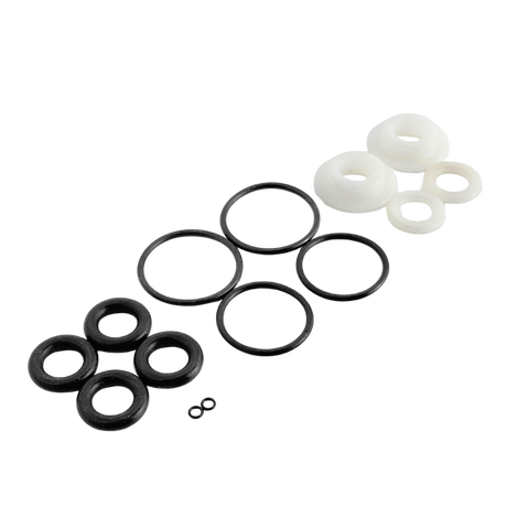 Set of black and white rubber washers on a white background