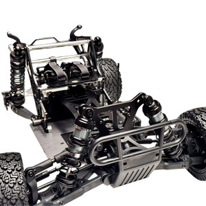 Close-up of a detailed metal chassis of a remote control car on a white background