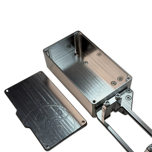 Metallic rectangular box with a cover on a white background