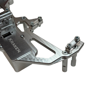 Metallic component with 'Kraken' branding on a white background