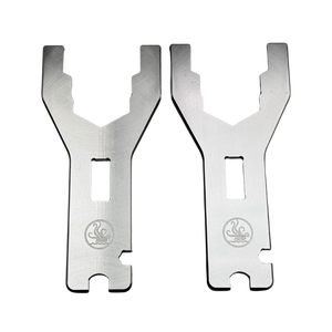 Two metal tools with a brand logo on a white background