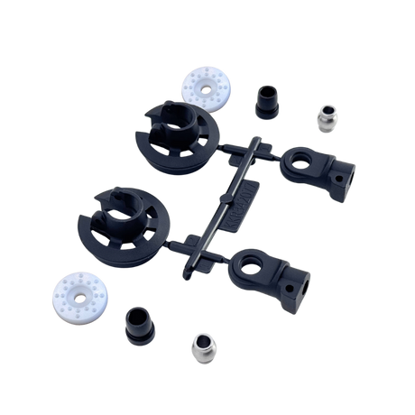 Set of replacement shock components on a white background