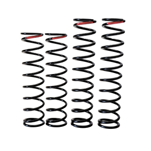 Four black coil springs with red accents on a white background