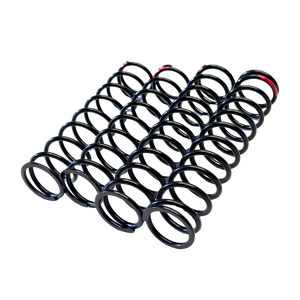 Set of black metal springs on a white background