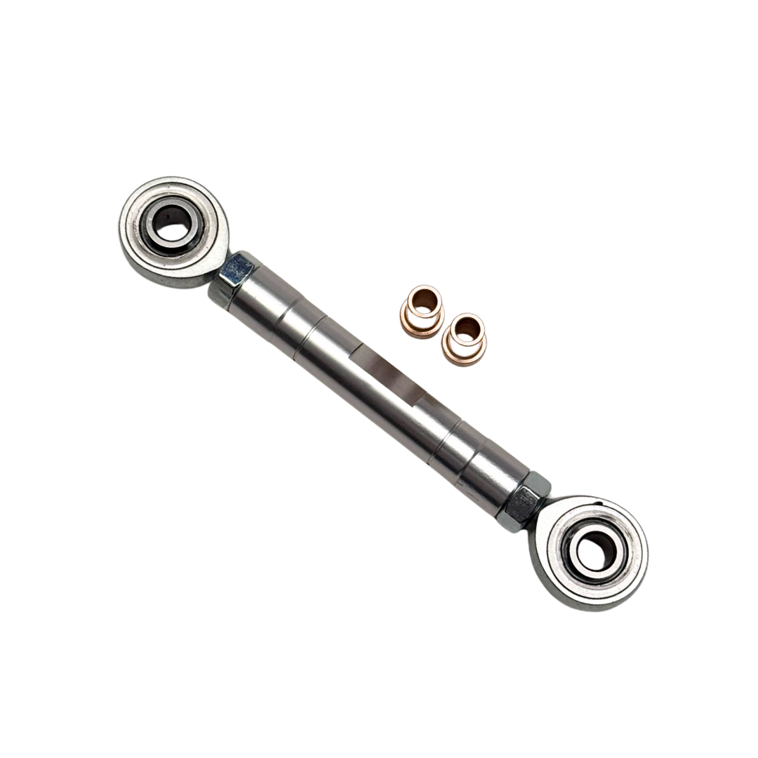Metal linkage with bearings on a white background
