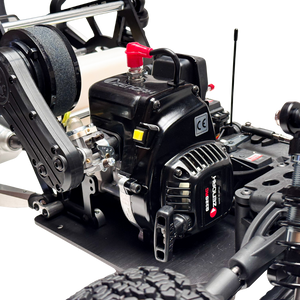 Close-up of a model engine and mechanical parts on a white background