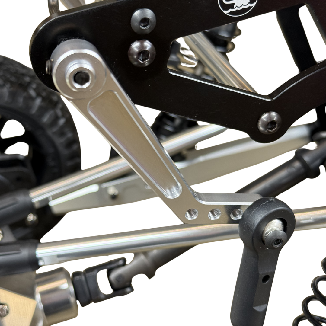 Close-up of a RC Car suspension on a white background
