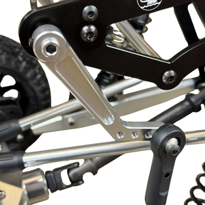 Close-up of a RC Car suspension on a white background