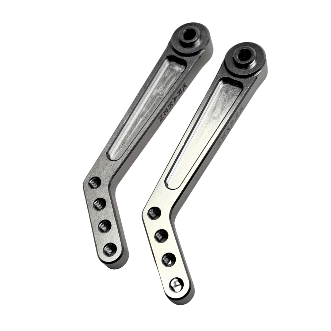 Two metal brackets on a white background