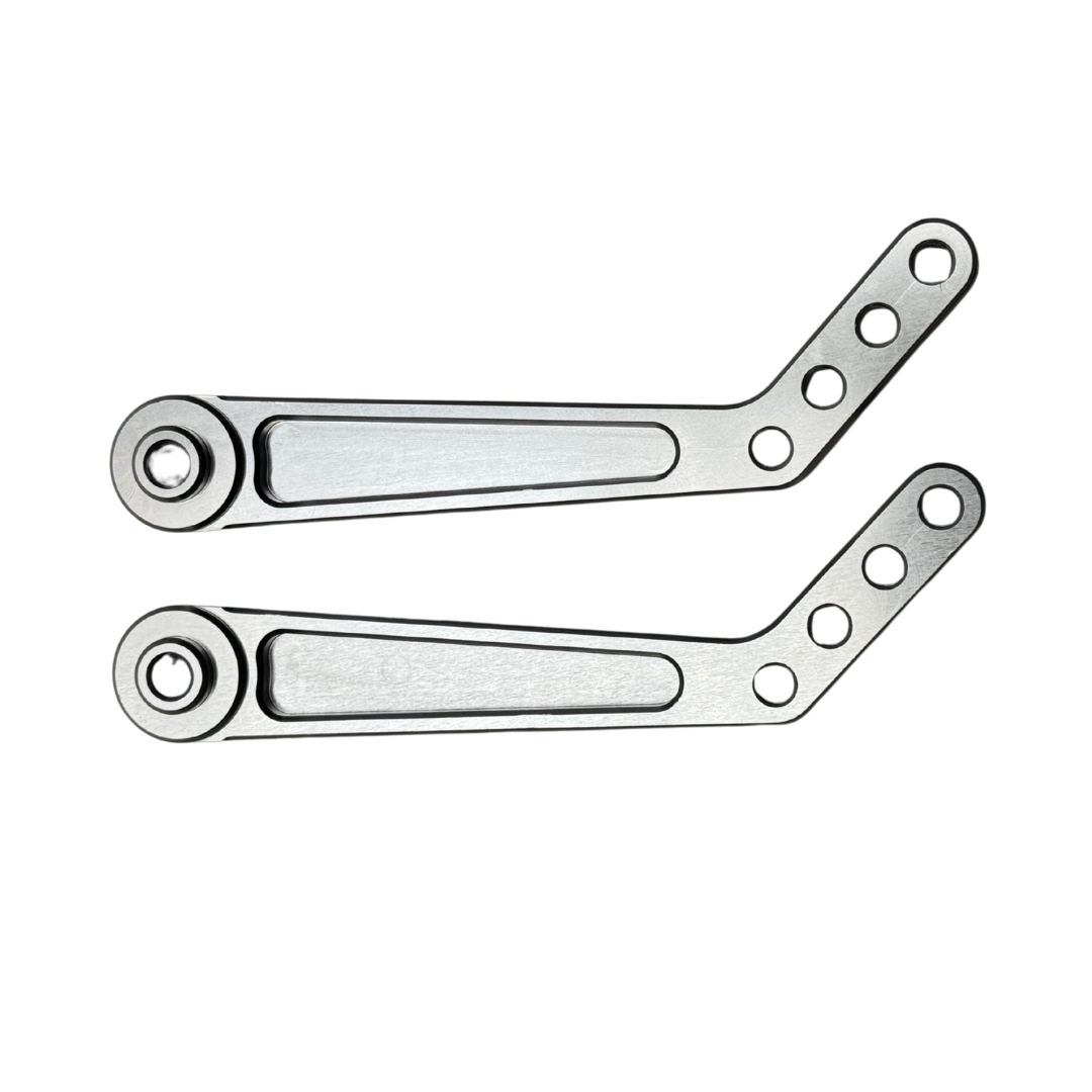 Two metallic metal brackets on a white background