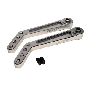 Two metal brackets with screws on a white background