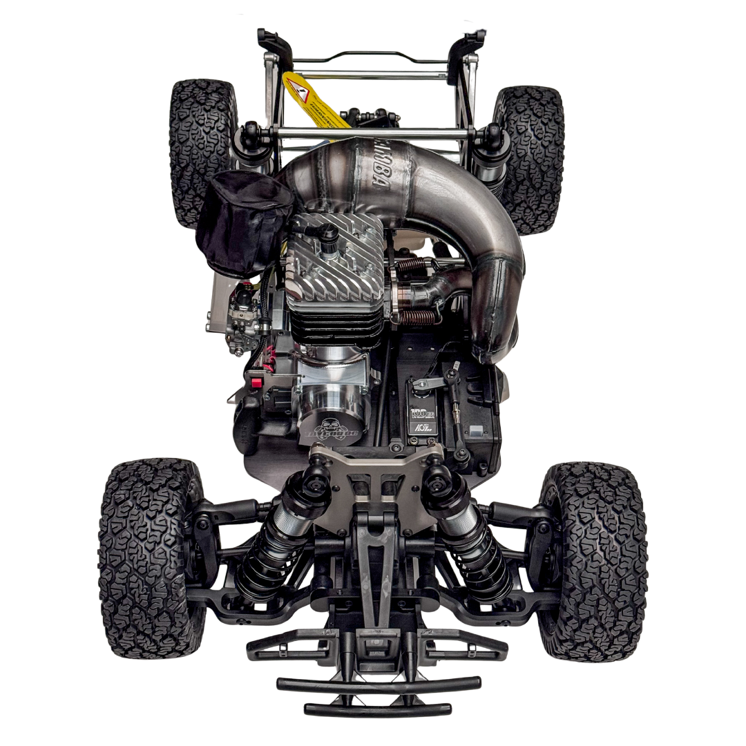 Engine and chassis of a remote-controlled car on a white background