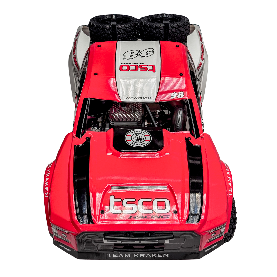Red off-road vehicle with visible branding on a white background