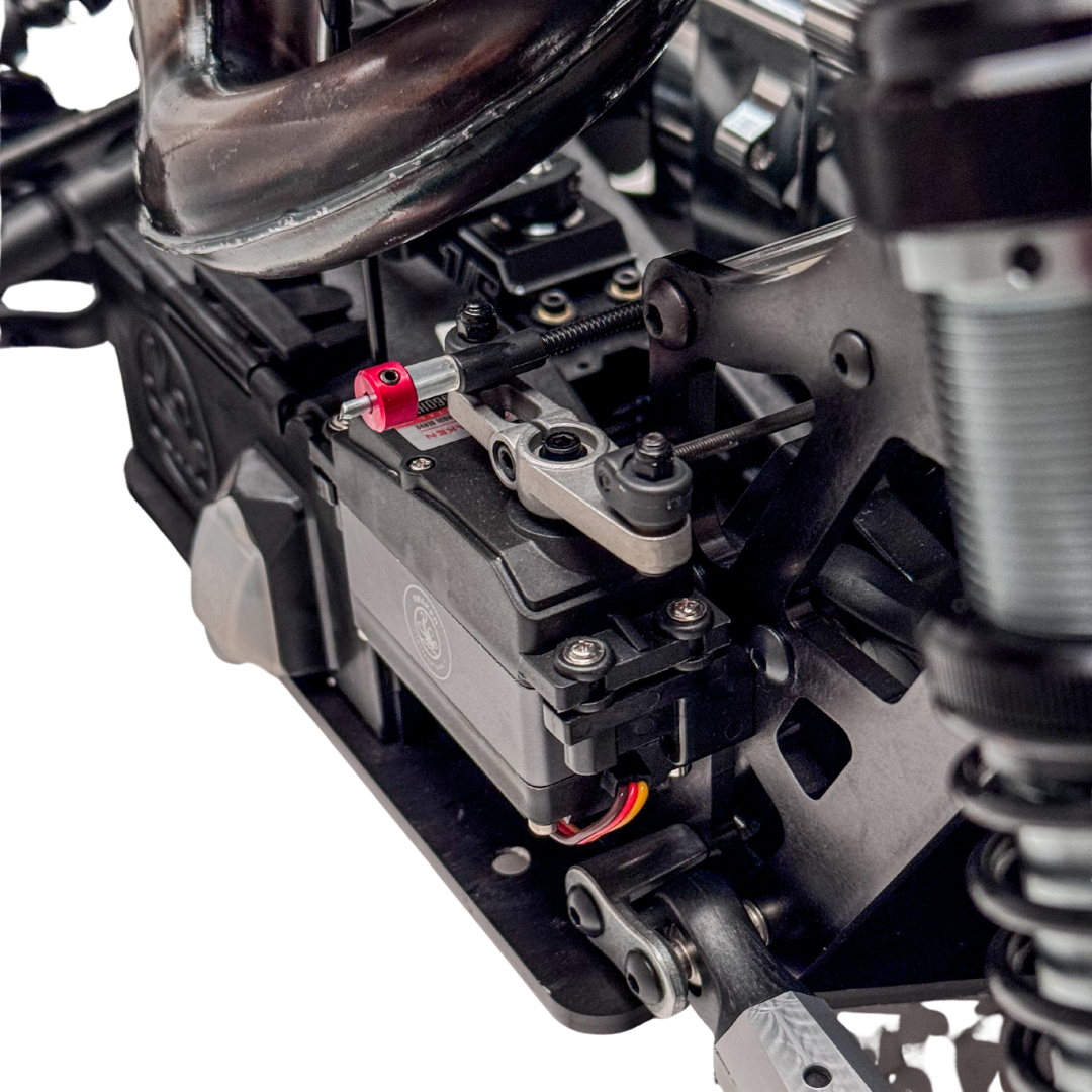 Close-up of a mechanical engine or motor assembly on a white background