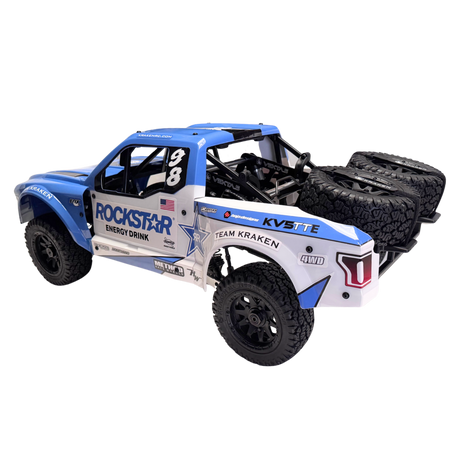 Model off-road truck with sponsor logos on a white background