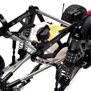 Close-up of a mechanical vehicle chassis with visible branding on a white background