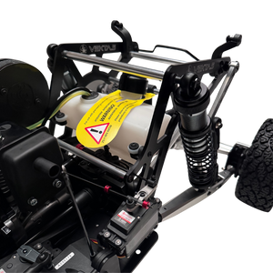 Close-up of a mechanical vehicle chassis with visible branding on a white background