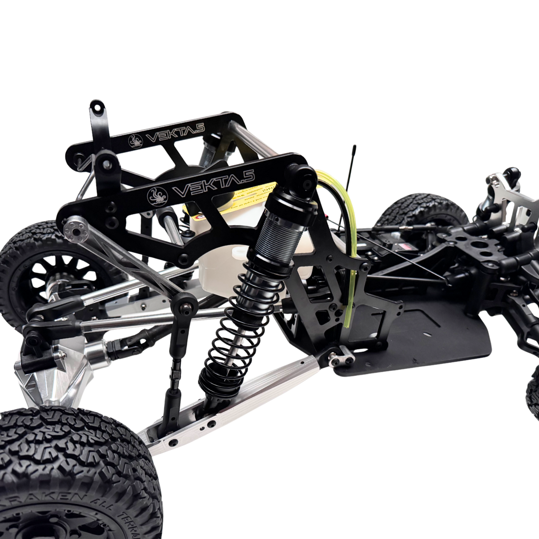 Close-up of a mechanical model with 'Vekta' branding on a white background