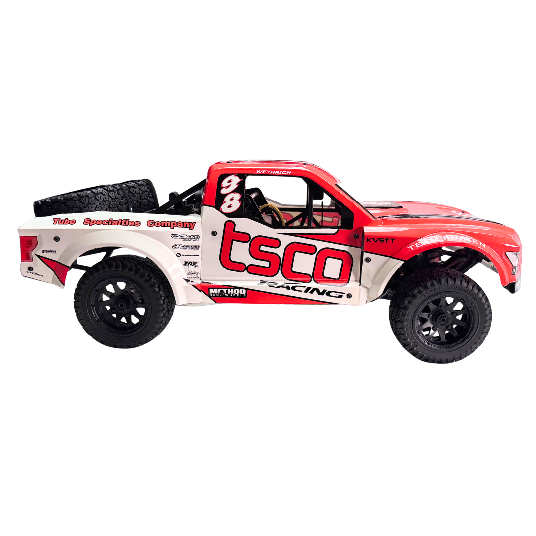 Red and white model truck with 'tsco' branding on a white background