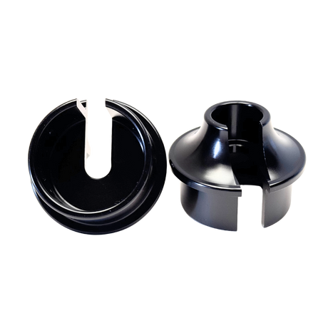 Two black plastic components on a white background
