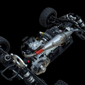 Close-up of a detailed RC car chassis with visible branding on a black background
