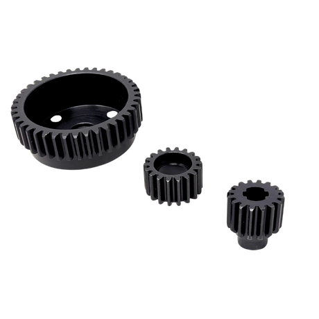 Three black metal gears of different sizes on a white background