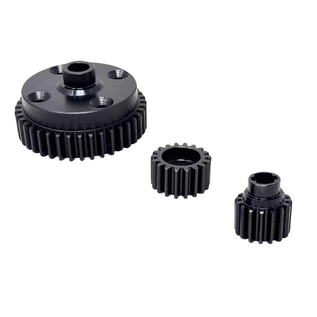 Three black metal gears of different sizes on a white background