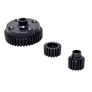 Three black metal gears of different sizes on a white background